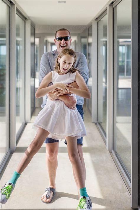 Nude daddy daughter - Smiling young daddy carrying excited little daughter, giving piggyback ride, dancing, having fun together. Happy small kid girl sitting on fathers shoulders, involved in funny activity at home. father daughter home stock videos & royalty-free footage. 00:10.
